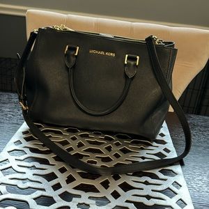 Michael Kors purse l- black gently used.